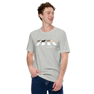 Men's and Unisex Light heather shirt design with four different Labrador dogs walking across Abbey Road.  Based on the Beatles famous album covers Abbey Road.