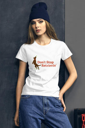White t-shirt with the words "Don't Stop Retrievin'" written in orange.  To the left is a brown retriever dog catching a ball